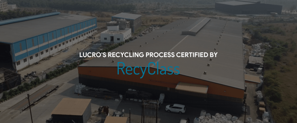 Aerial view of Lucro’s recycling facility with the words Lucro’s recycling process certified by RecyClass